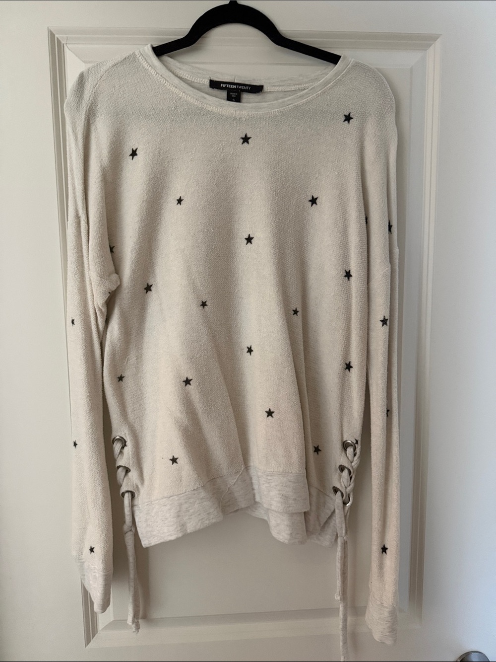 NEW LISTING! FIFTEEN TWENTY terry top with Black Star Print and Side Lace-Up